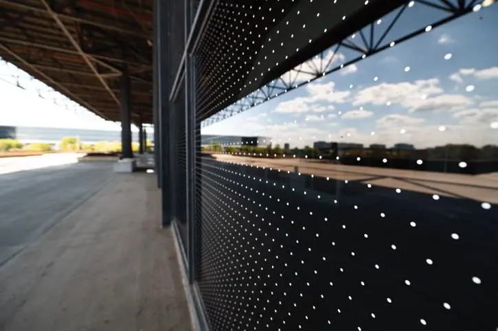 A view of the sky from inside a building.