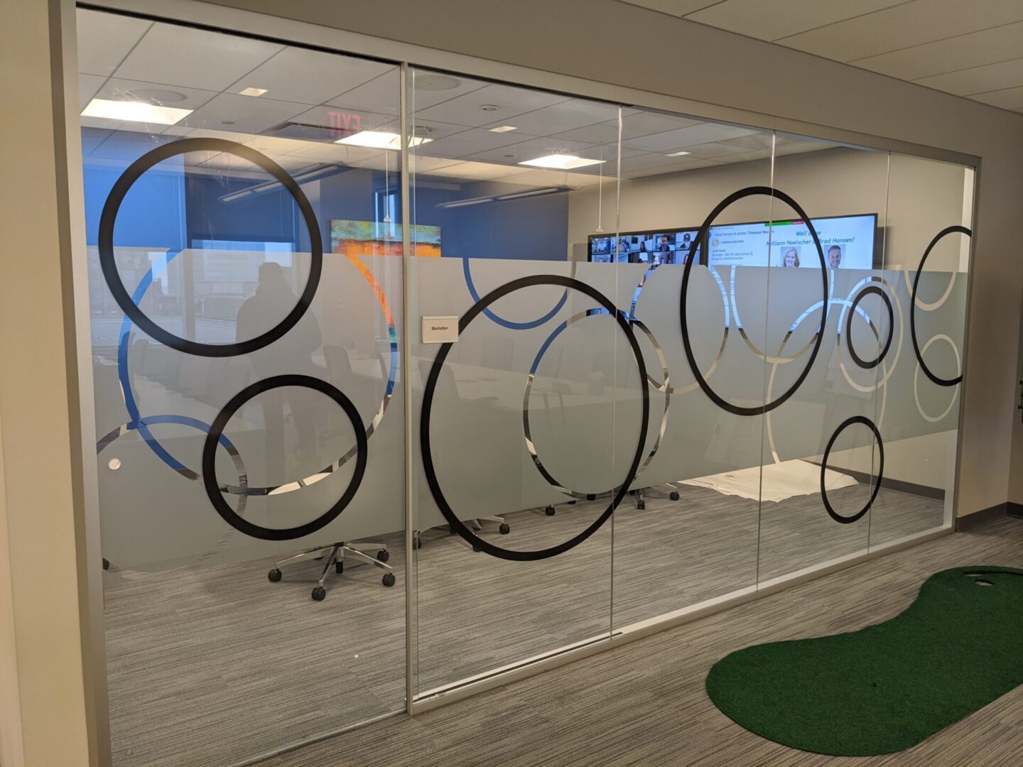 A glass wall with circles on it